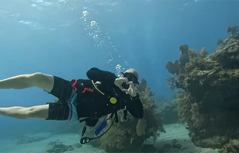 a person in a scuba gear underwater