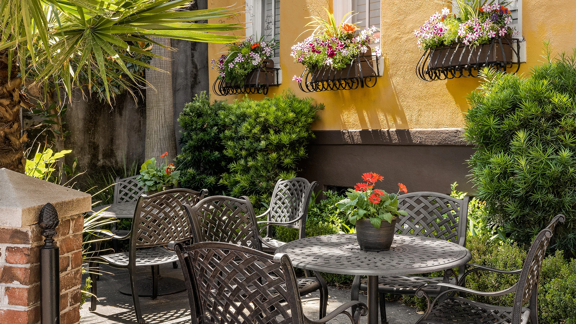 a table and chairs outside a building
