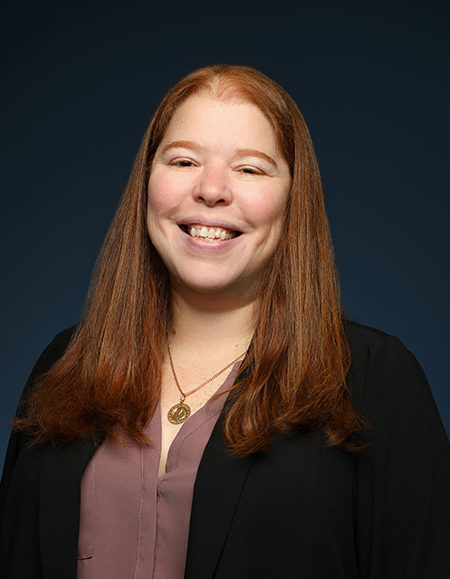 a woman smiling for a picture