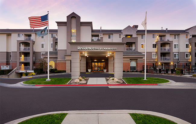 a building with flags in front of it