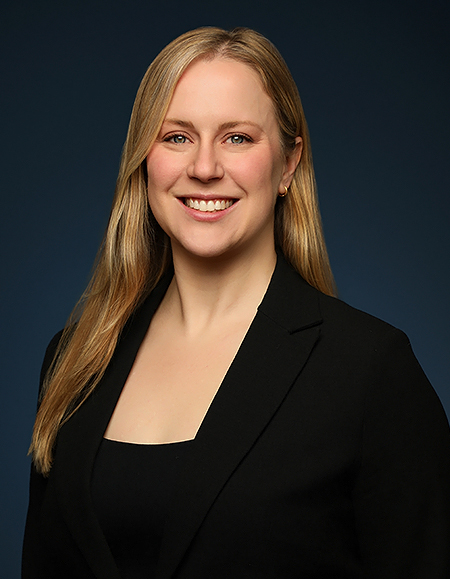 a woman in a black suit