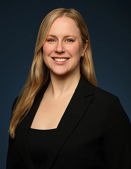 a woman in a black suit