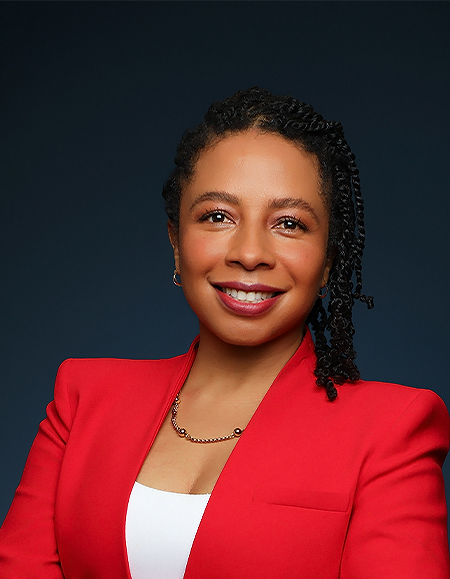 a woman in a red jacket