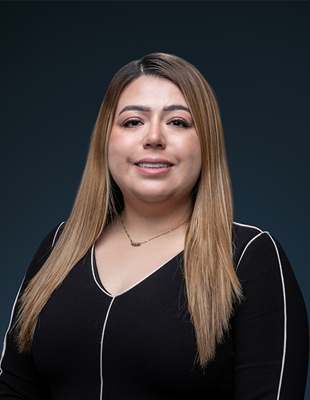 a woman with blonde hair and a black shirt