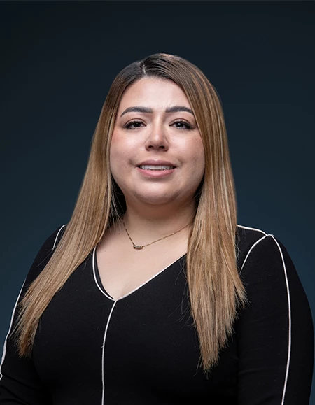 a woman with blonde hair and a black shirt