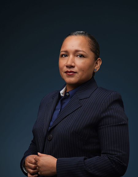a woman in a pinstriped suit