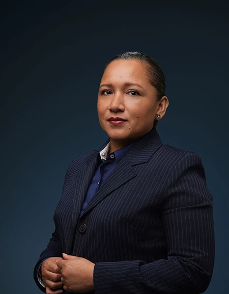 a woman in a pinstriped suit