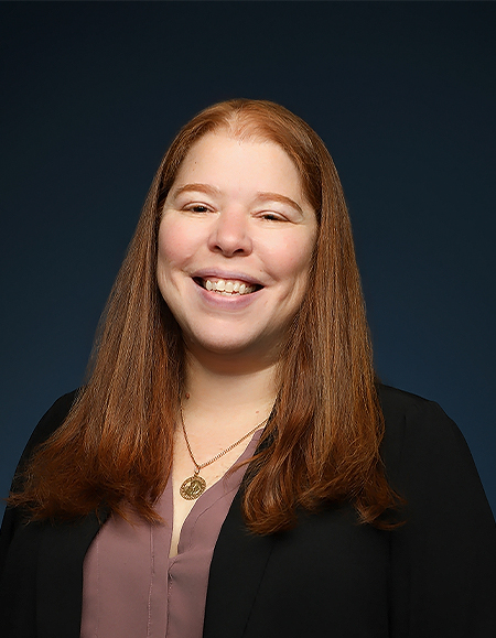 a woman smiling for a picture