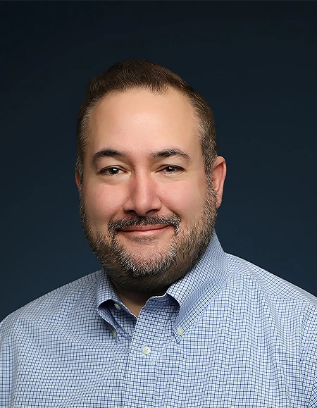 a man in a blue shirt