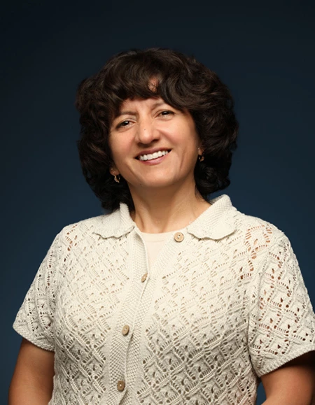 a woman smiling for a picture