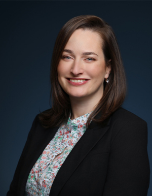 a woman smiling at the camera