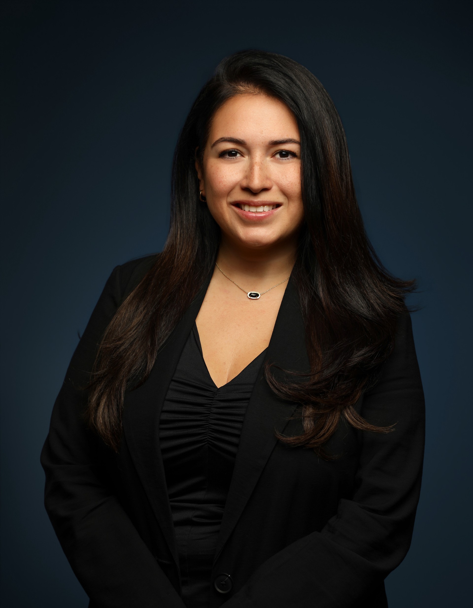 a woman in a black suit