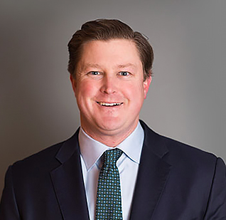 a man in a suit and tie
