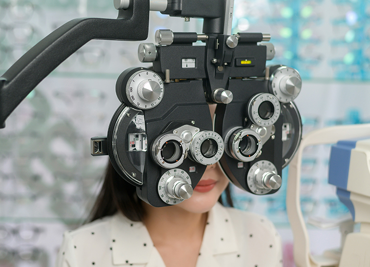 a woman with a machine over her eyes