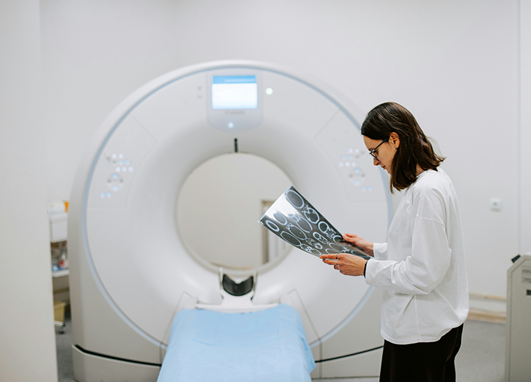 a woman looking at a scan