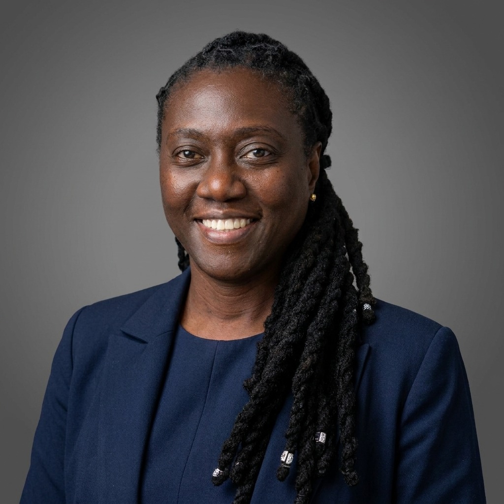 a woman smiling at the camera