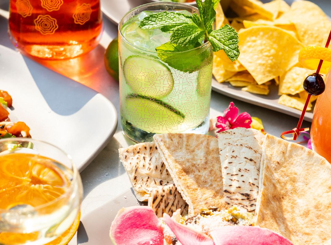 a plate of food and drinks