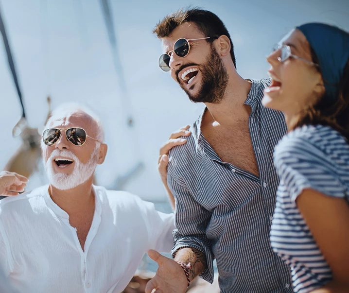 people laughing with sunglasses on