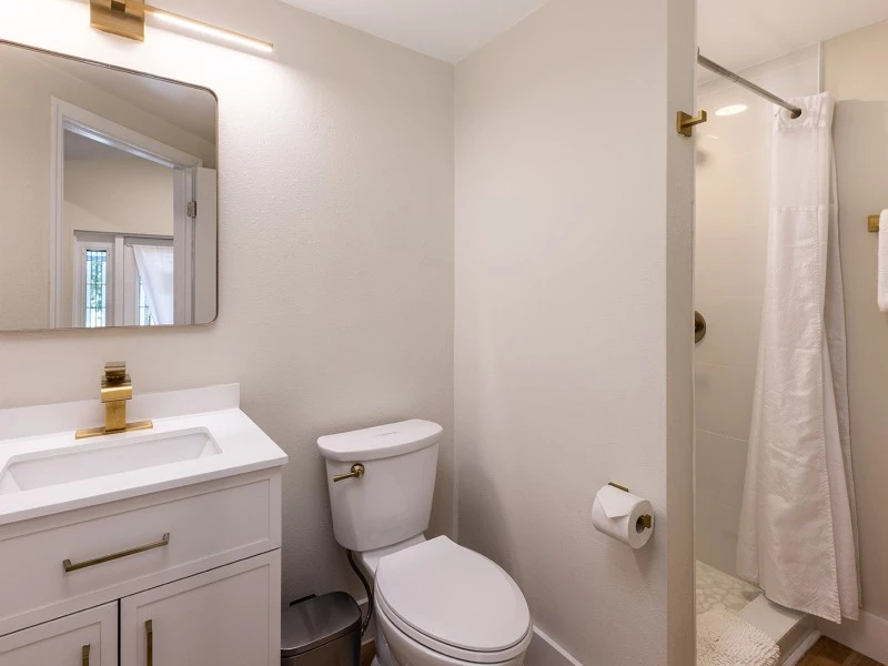 a bathroom with a toilet and sink
