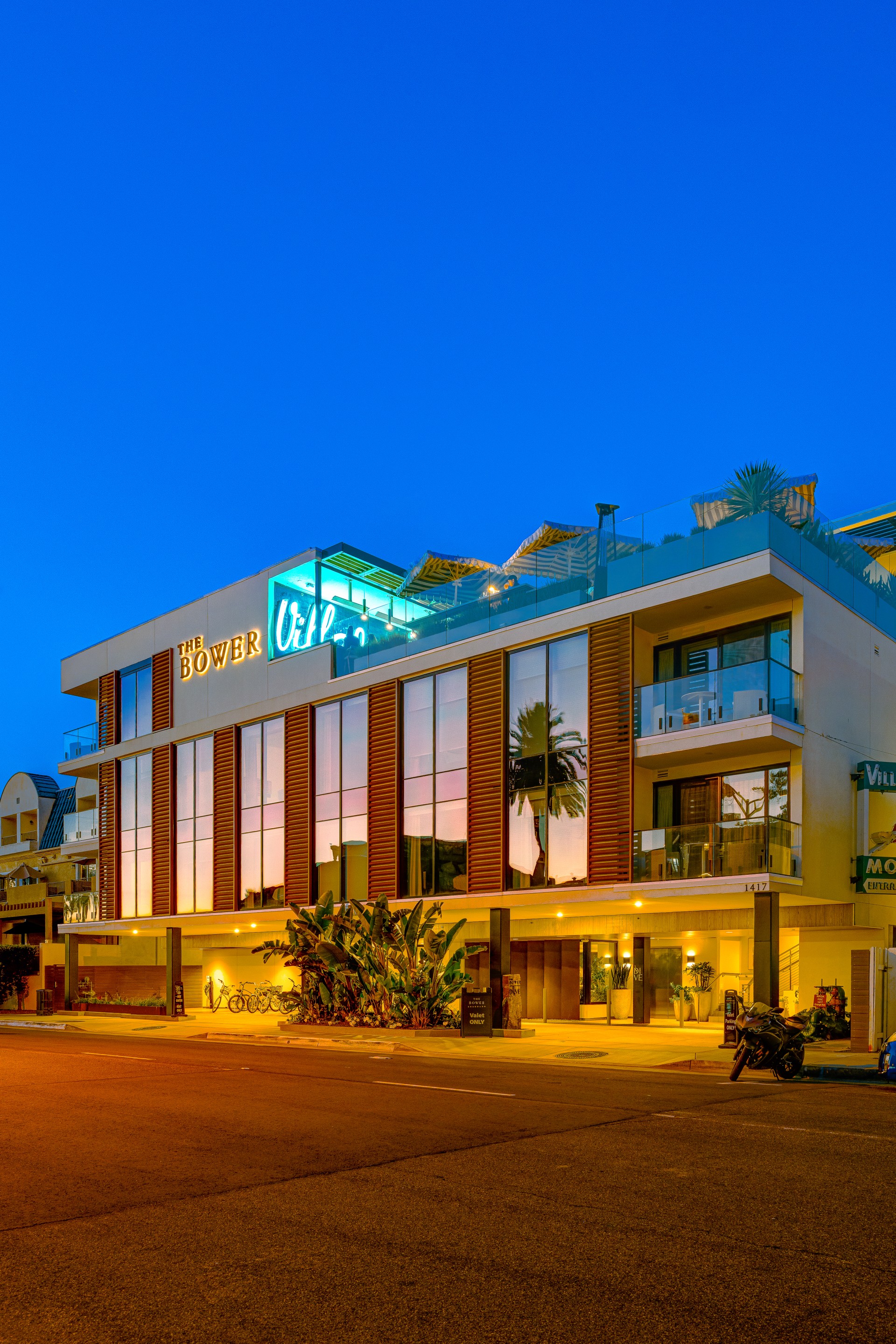 a building with a lot of windows and a street