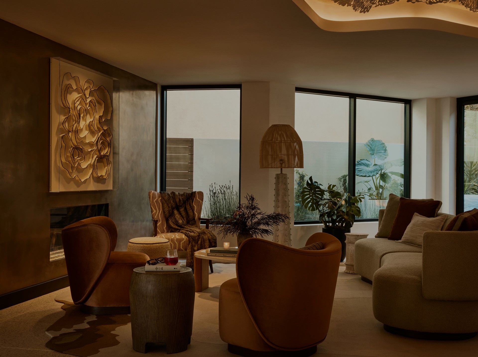 a living room with a fireplace and couches