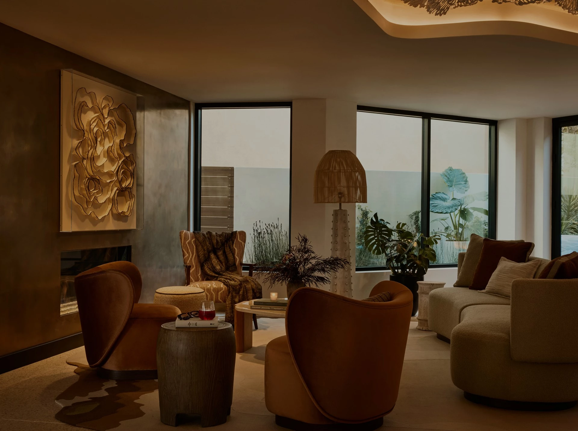 a living room with a fireplace and couches