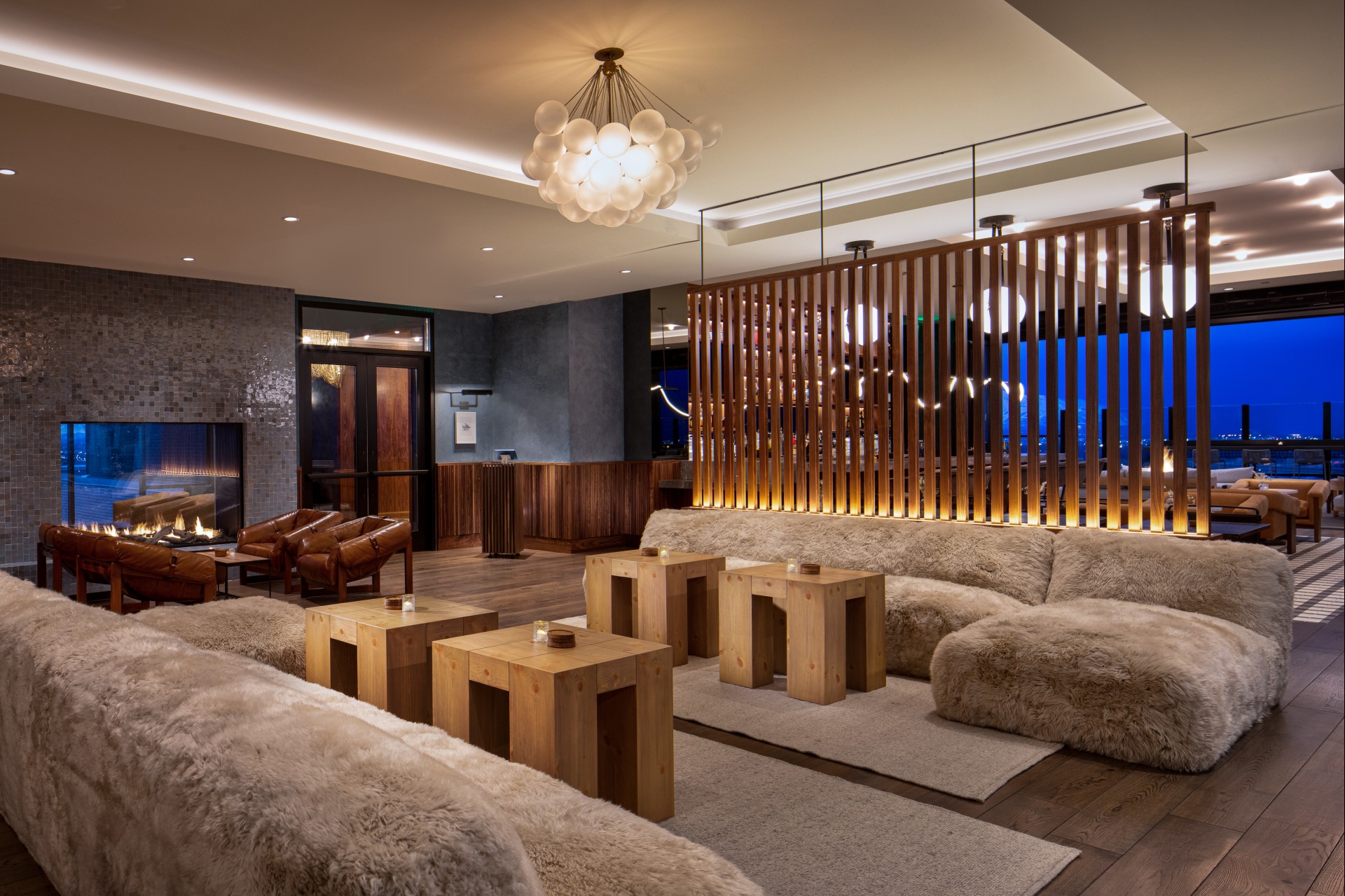 a room with a couch and tables