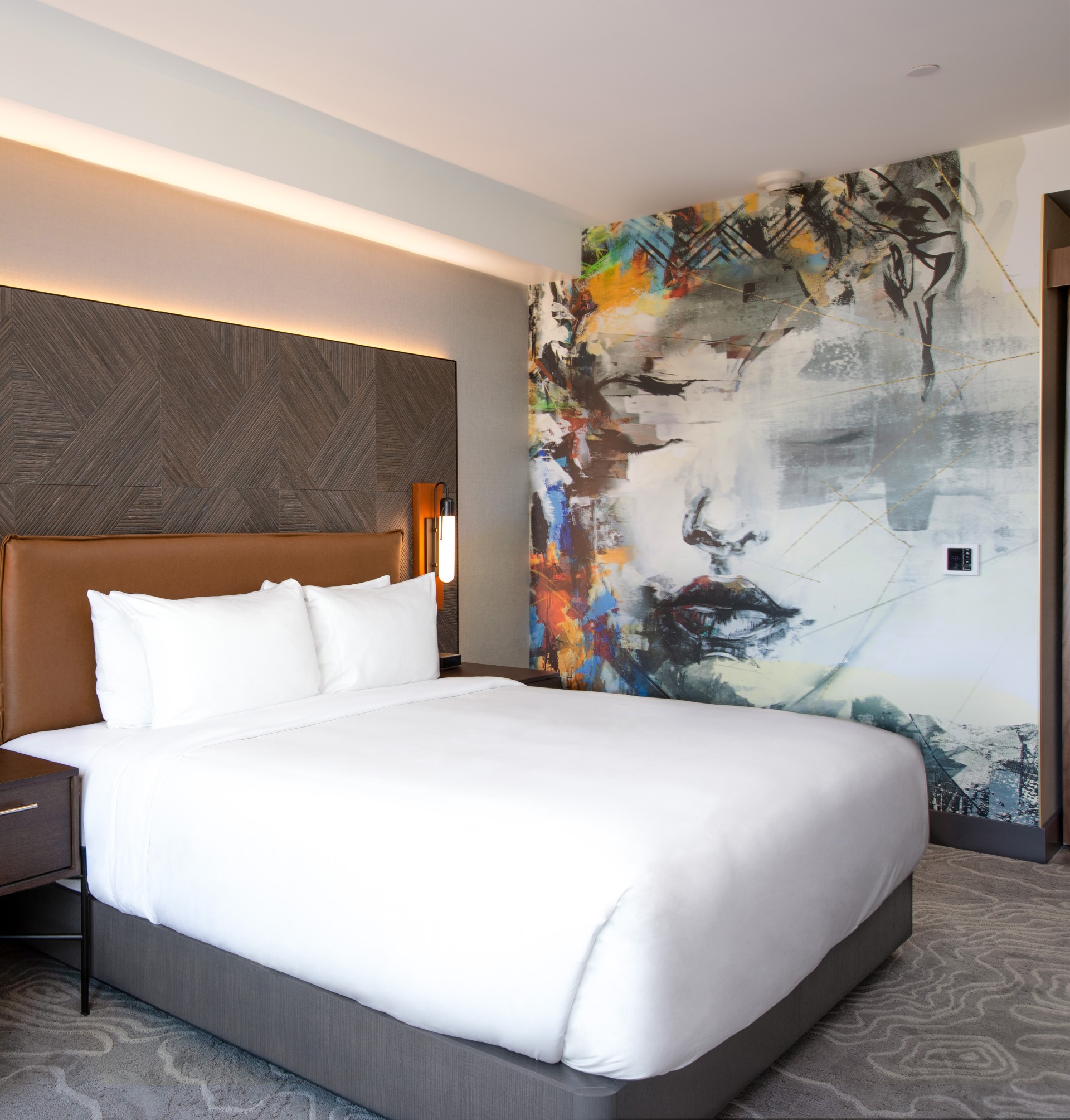 a bed in a hotel room