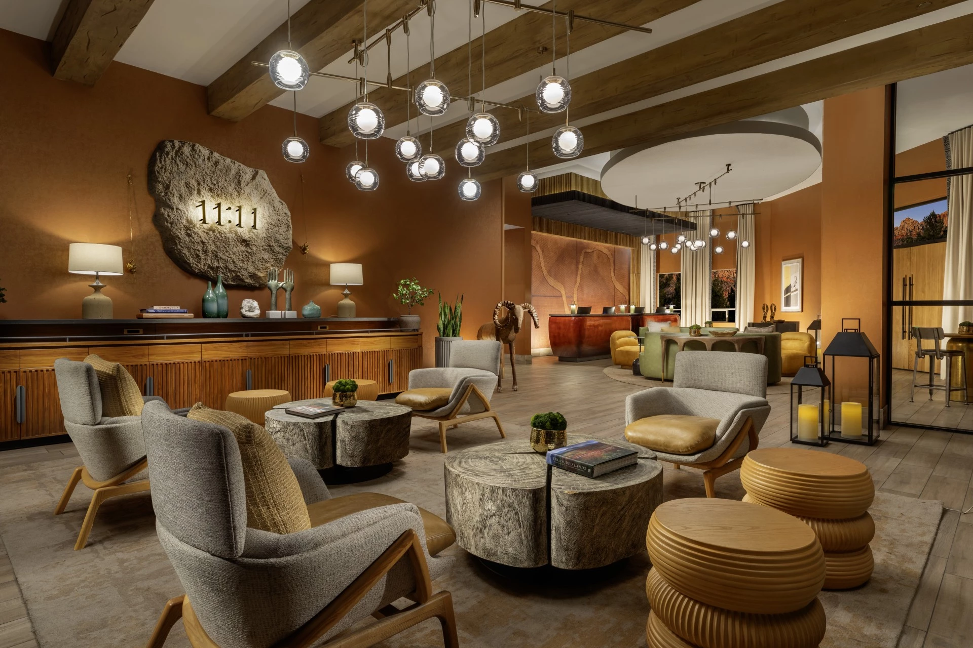 a room with a large area with chairs and tables