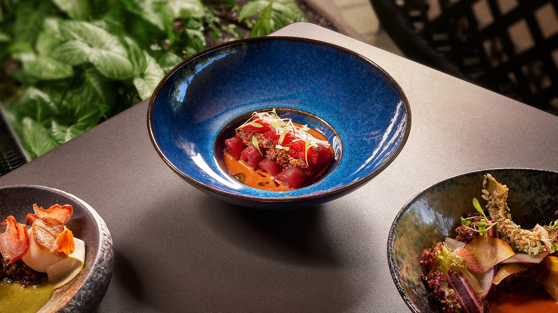 a blue bowl with food in it Next