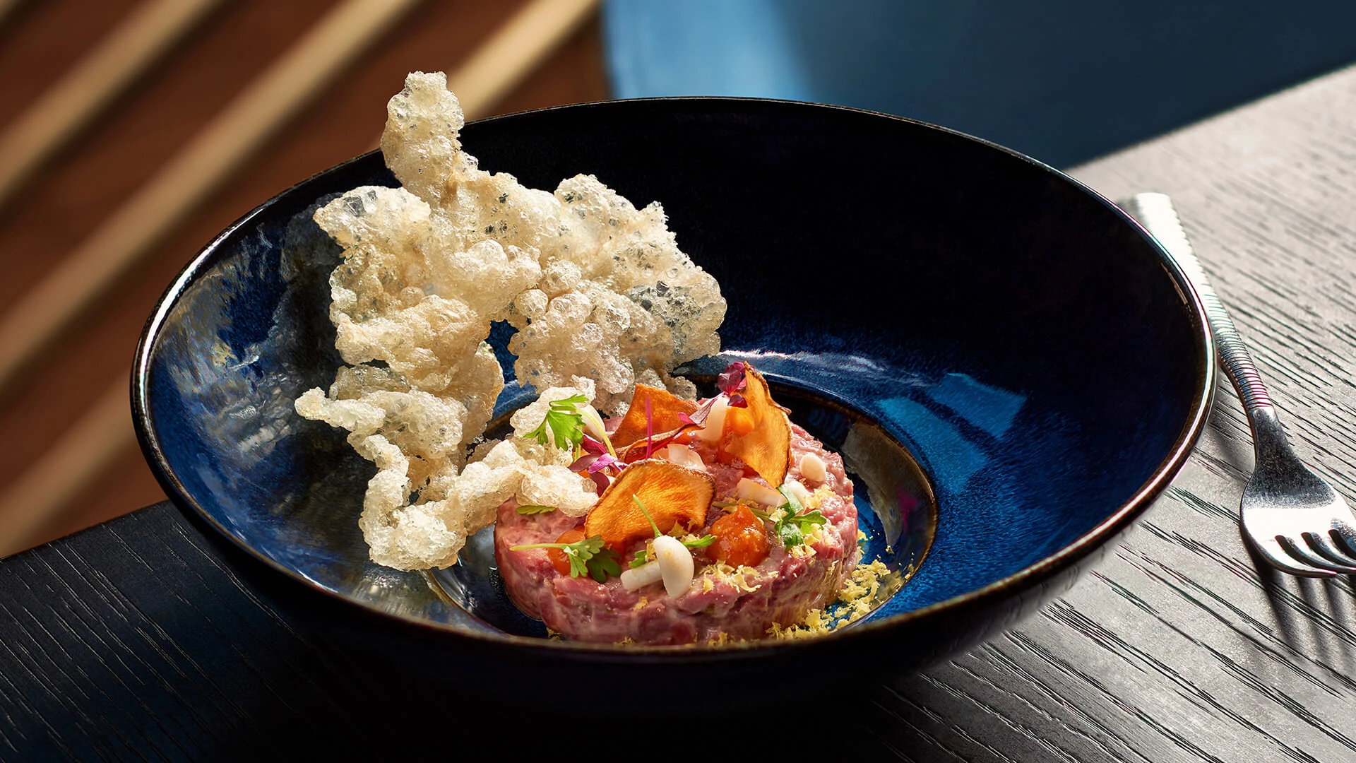 a plate of food on a table Next