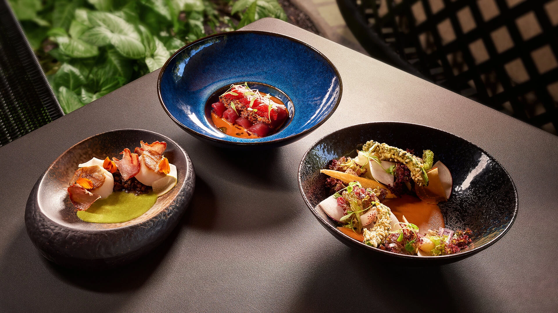 a group of bowls of food Next