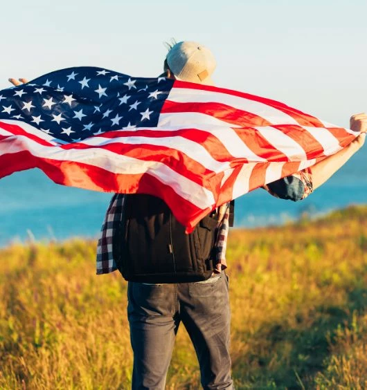 a man holding a flag