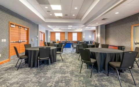 a room with tables and chairs