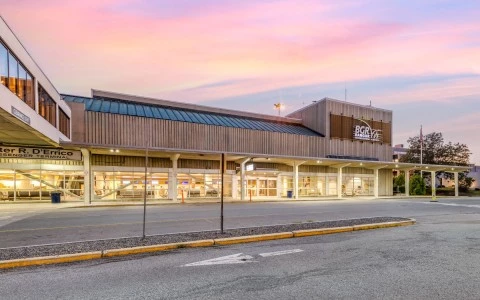 an airport building with a lot of windows