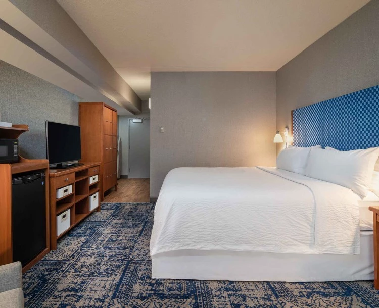 hotel bedroom in gray accents of property
