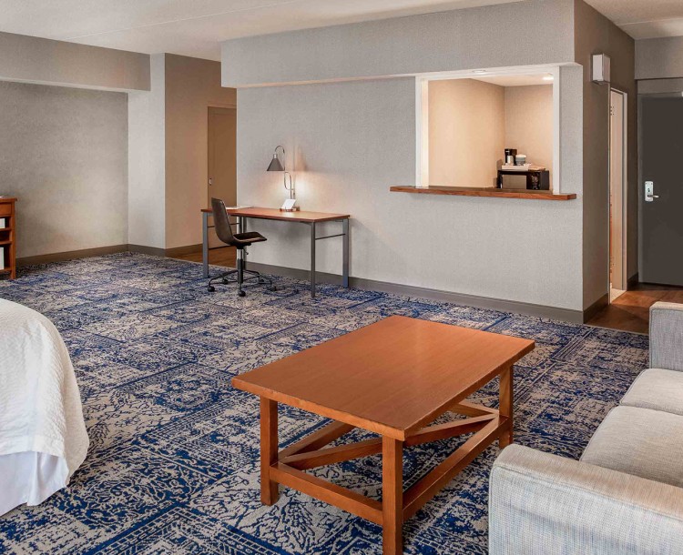 sitting area within suite hotel room of property 