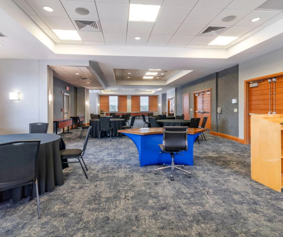 a room with tables and chairs