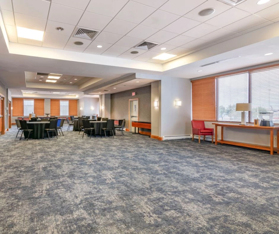 a room with tables and chairs
