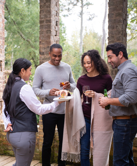 a group of people standing outside