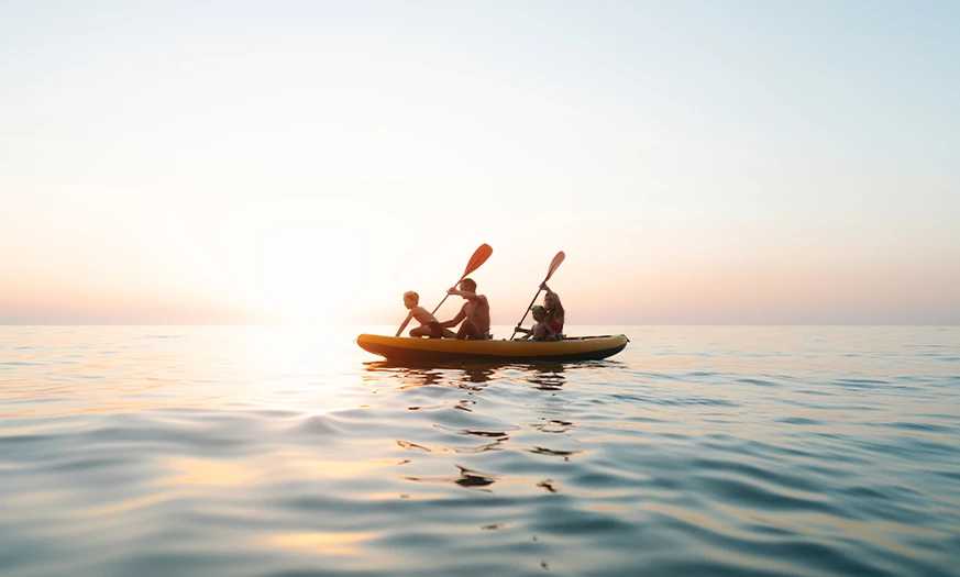 a group of people in a kayak