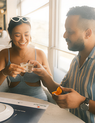 a man and woman sitting at a table