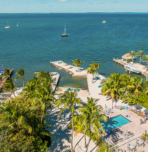 a body of water with a dock and a pool