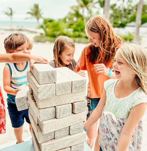 a group of kids playing with blocks