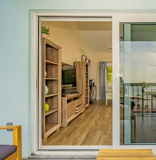 a sliding glass door with a television and a television on it