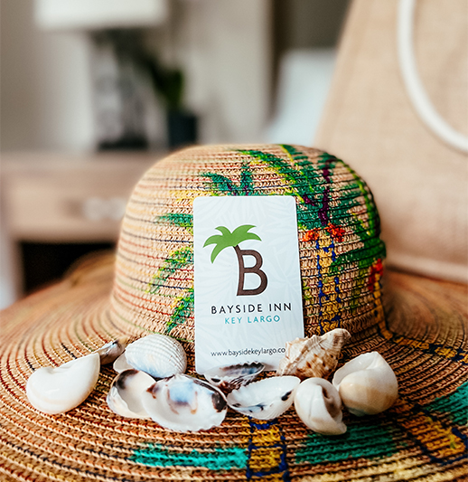 a hat with shells on it