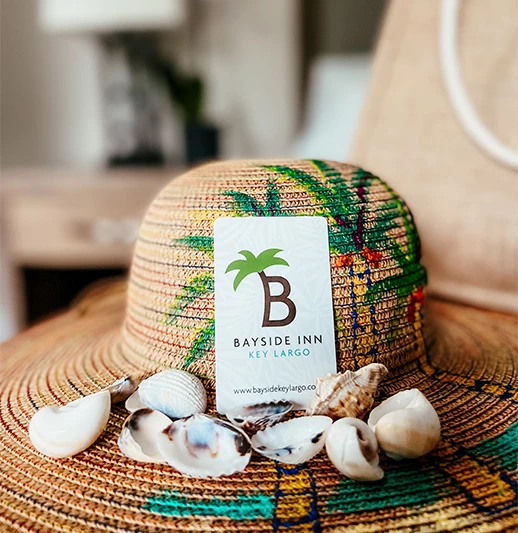 a hat with shells on it