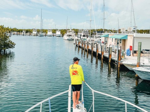 a man standing on a boat