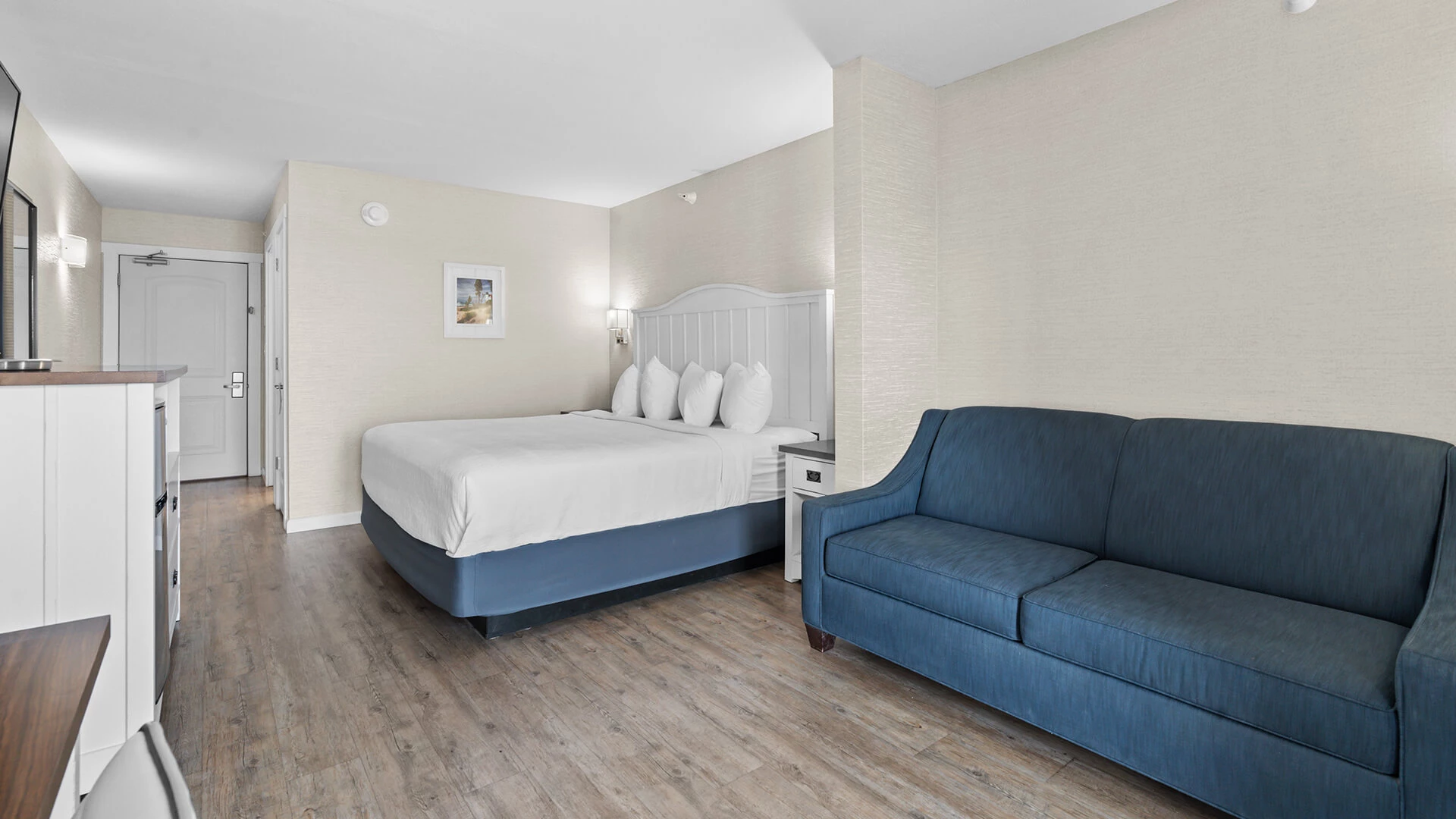 a room with a bed and a couch