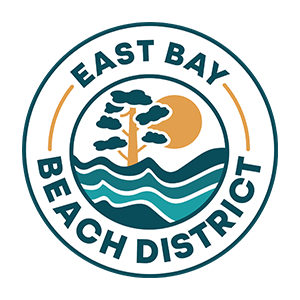 a logo with a tree and waves